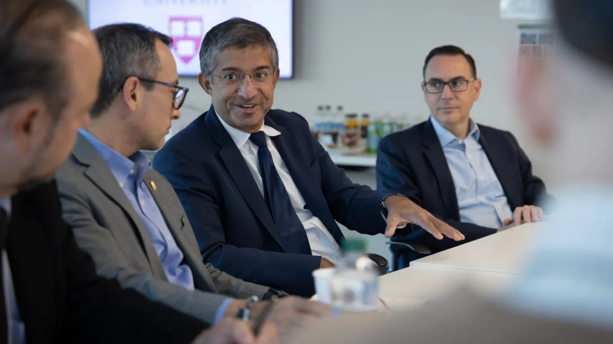 Photo of Bharat Anand, Vice Provost for Advances in Learning at Harvard University speaking with representatives of the  Ibero-American Technology Foundation at the event held in December 2023.