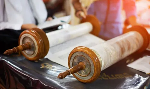 Photo of torah scroll laying on table